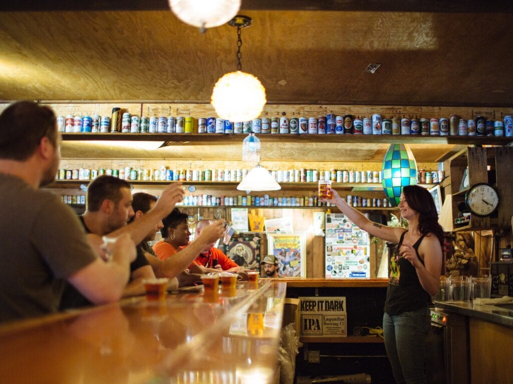 people cheerings at Lagunitas Brewing Company