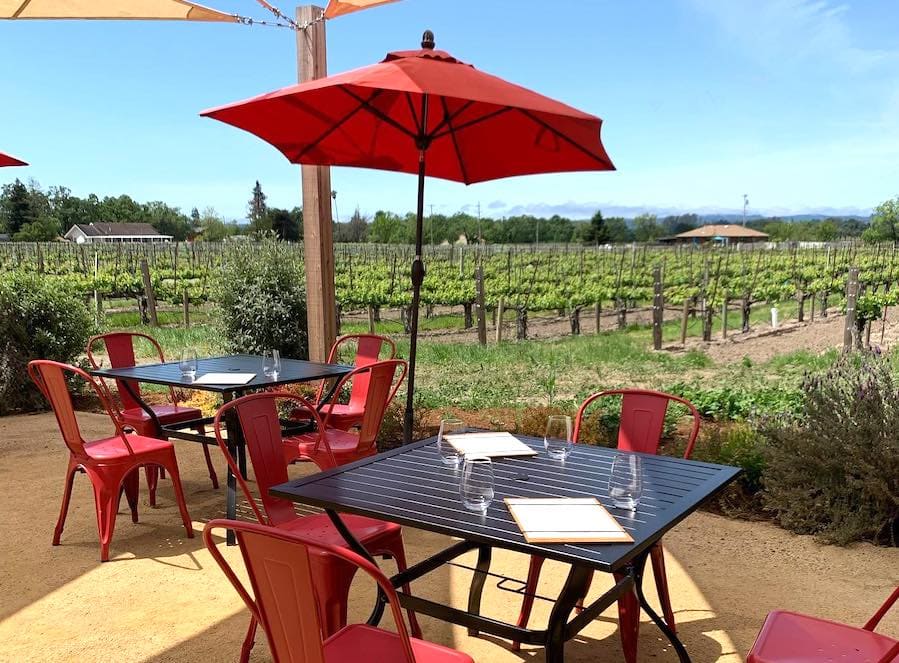 Vineyard-side seating at Hook & Ladder Winery 
