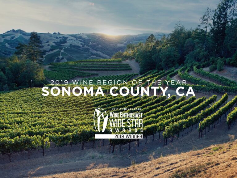 vineyard scene with text over the vineyards saying 2019 wine region of the year sonoma county, ca wine enthusiast wine star awards 2019 winner