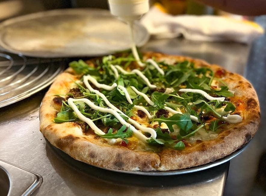 White pizza with wagyu sausage, fennel, calabrian chili honey and arugula at Glen Ellen Star