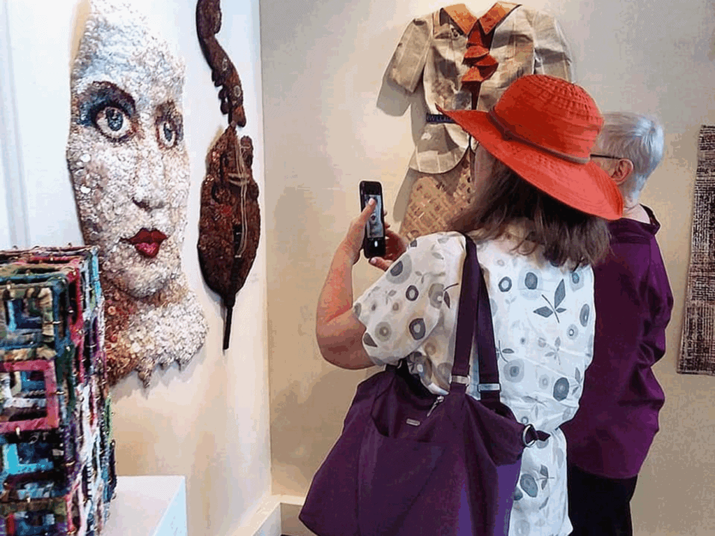 visitors taking photos of the art in the healdsburg center for the arts in sonoma county