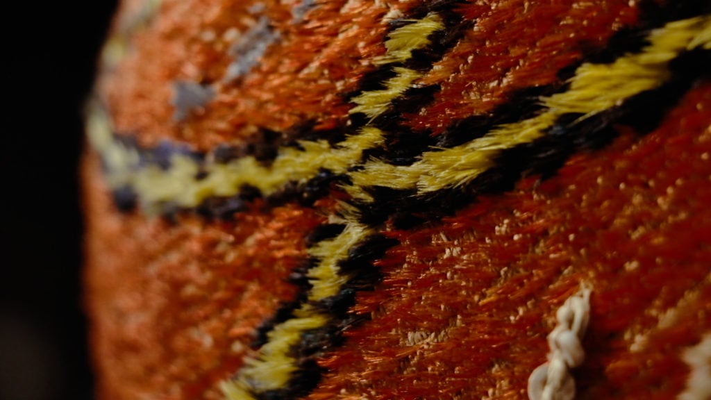 Detail from Pomo basket on display at Pepperwood—Photo by Joshua Dylan Mellars/Northern California Public Media