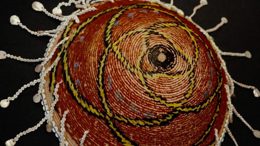 A Pomo basket from the Peter and Kirsten Bedford collection, exhibited at the Pepperwood Preserve in Santa Rosa—Photo by Joshua Dylan Mellars/Northern California Public Media