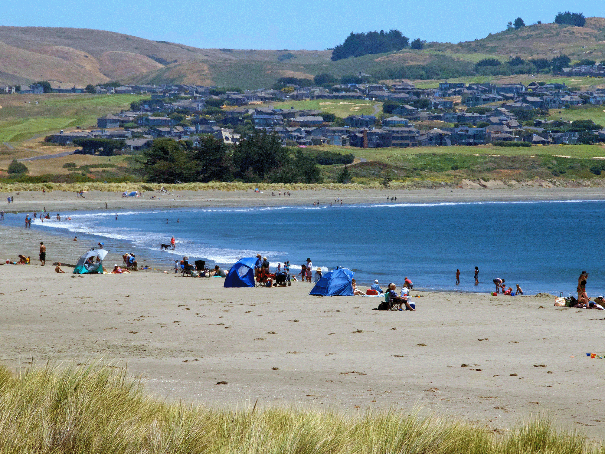 People play in the sand at Doran Regional Park