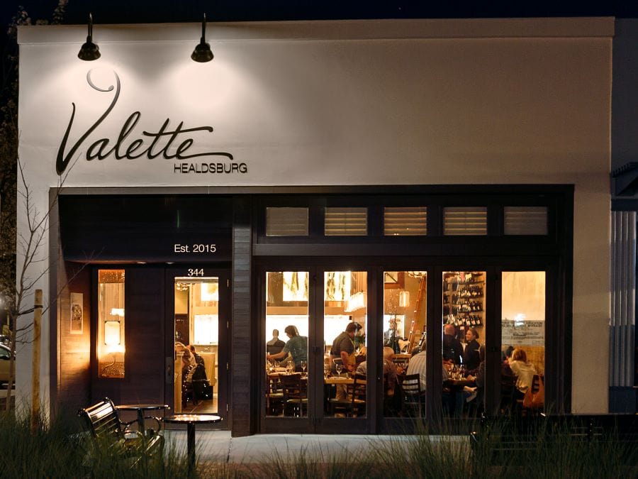 Valette Restaurant at night with diners inside