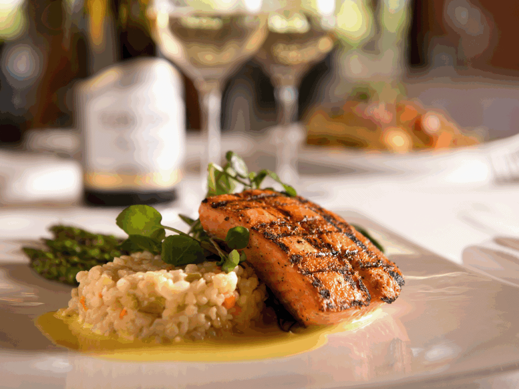 Salmon on top of risotto served at John Ash Santa Rosa