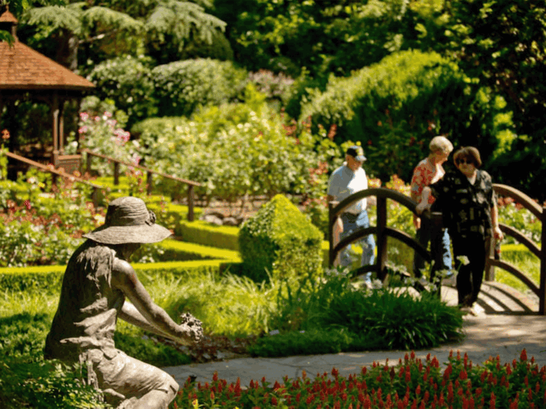visitors walking the flower garden at ferrari carano vineyards and winery in sonoma county