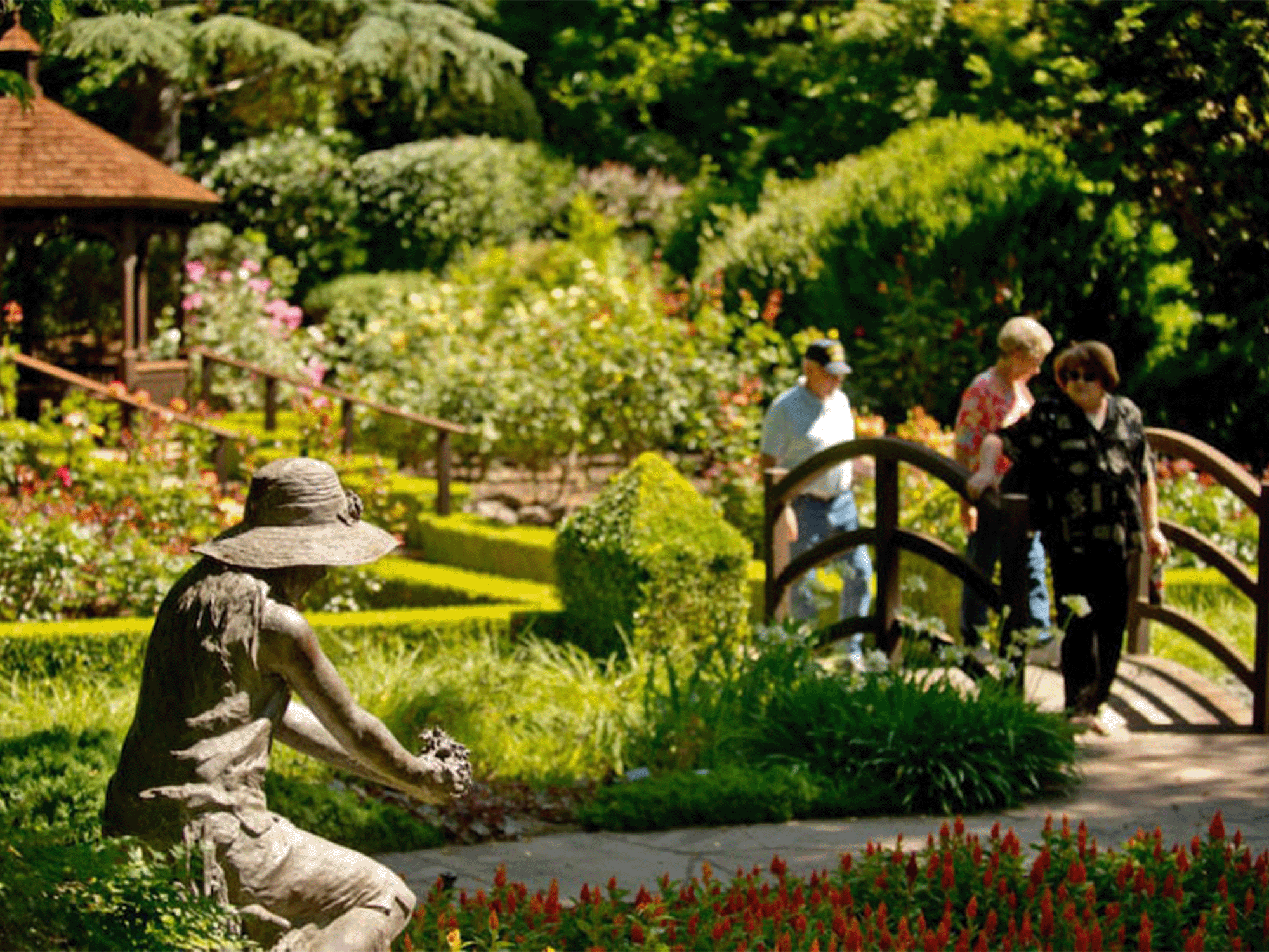 visitors walking the flower garden at ferrari carano vineyards and winery in sonoma county