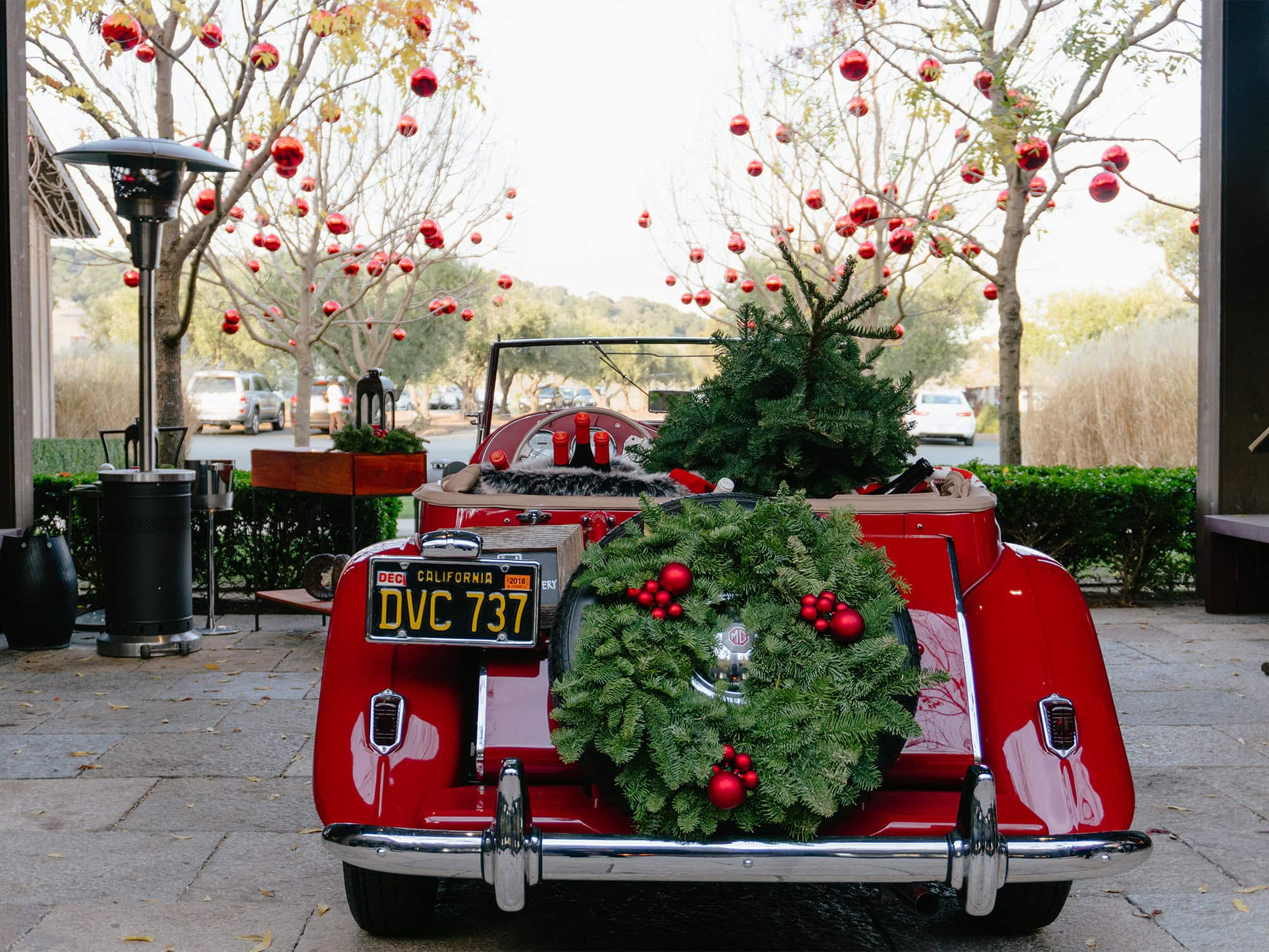 red car decorated for the holidays at rams gate winery in sonoma ca