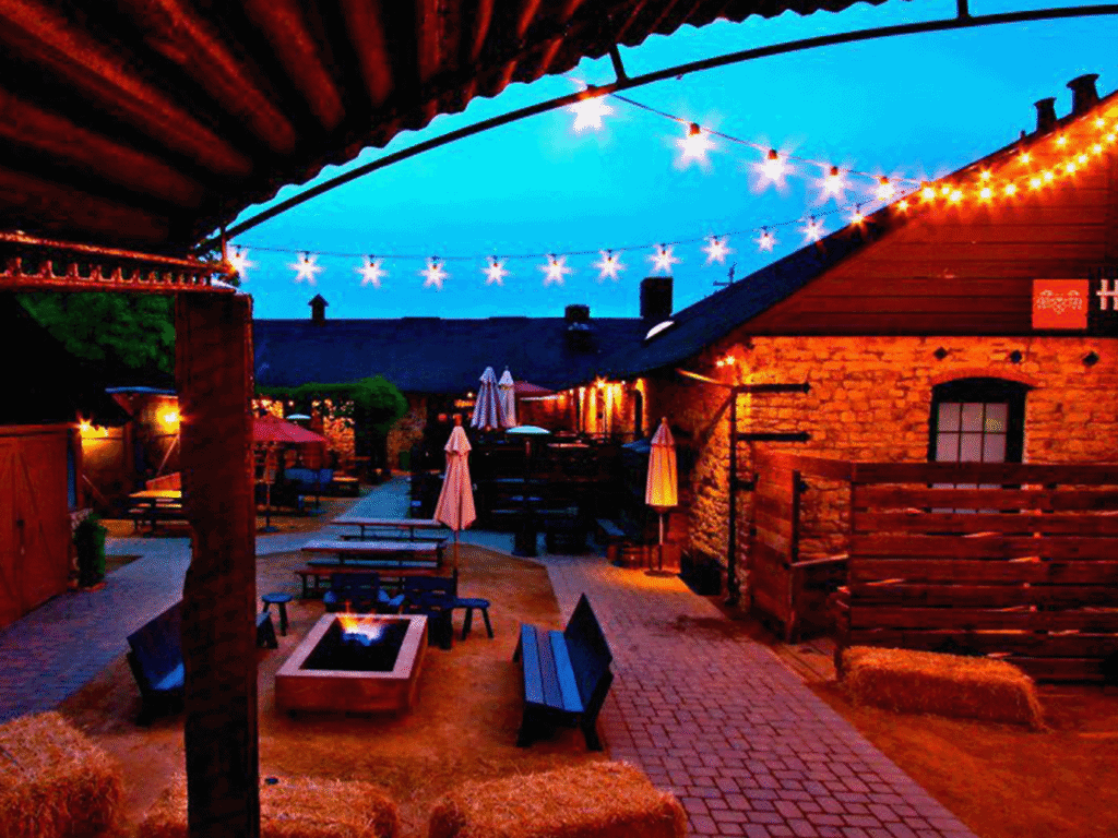 outside patio lite up at night at hopmonk tavern and beer garden in sonoma county