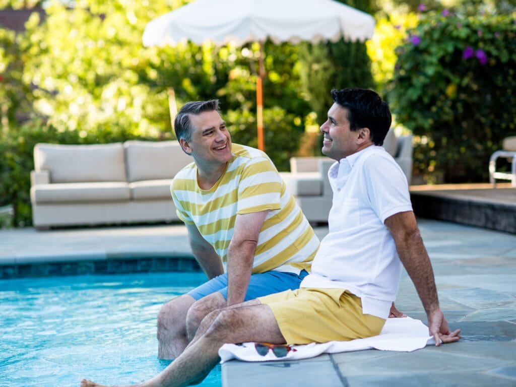 couple sitting by the pool at farmhouse inn in forestville