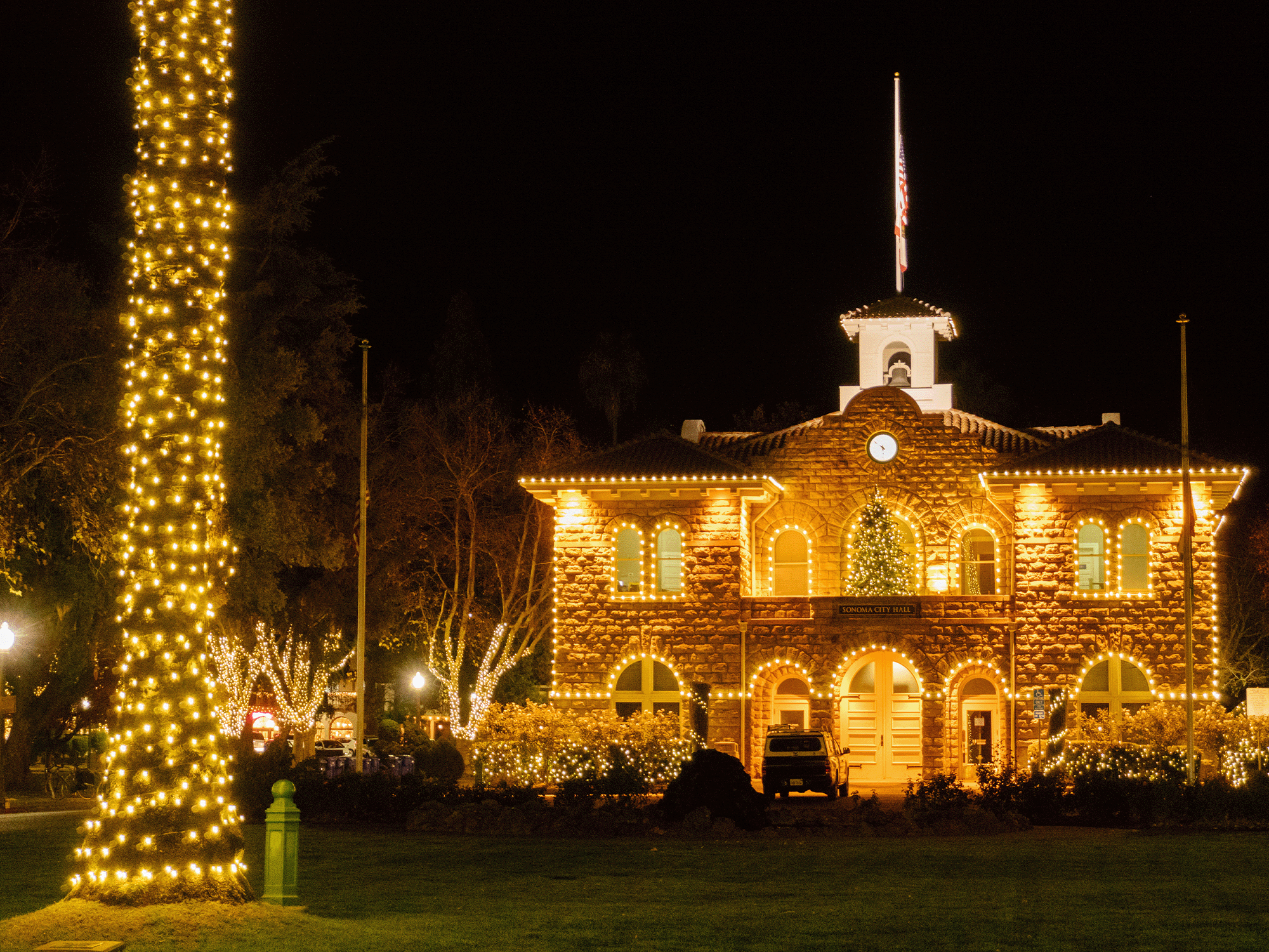sonoma city hall and plaza during the lighting of the sonoma plaza event for the holiday season in sonoma county
