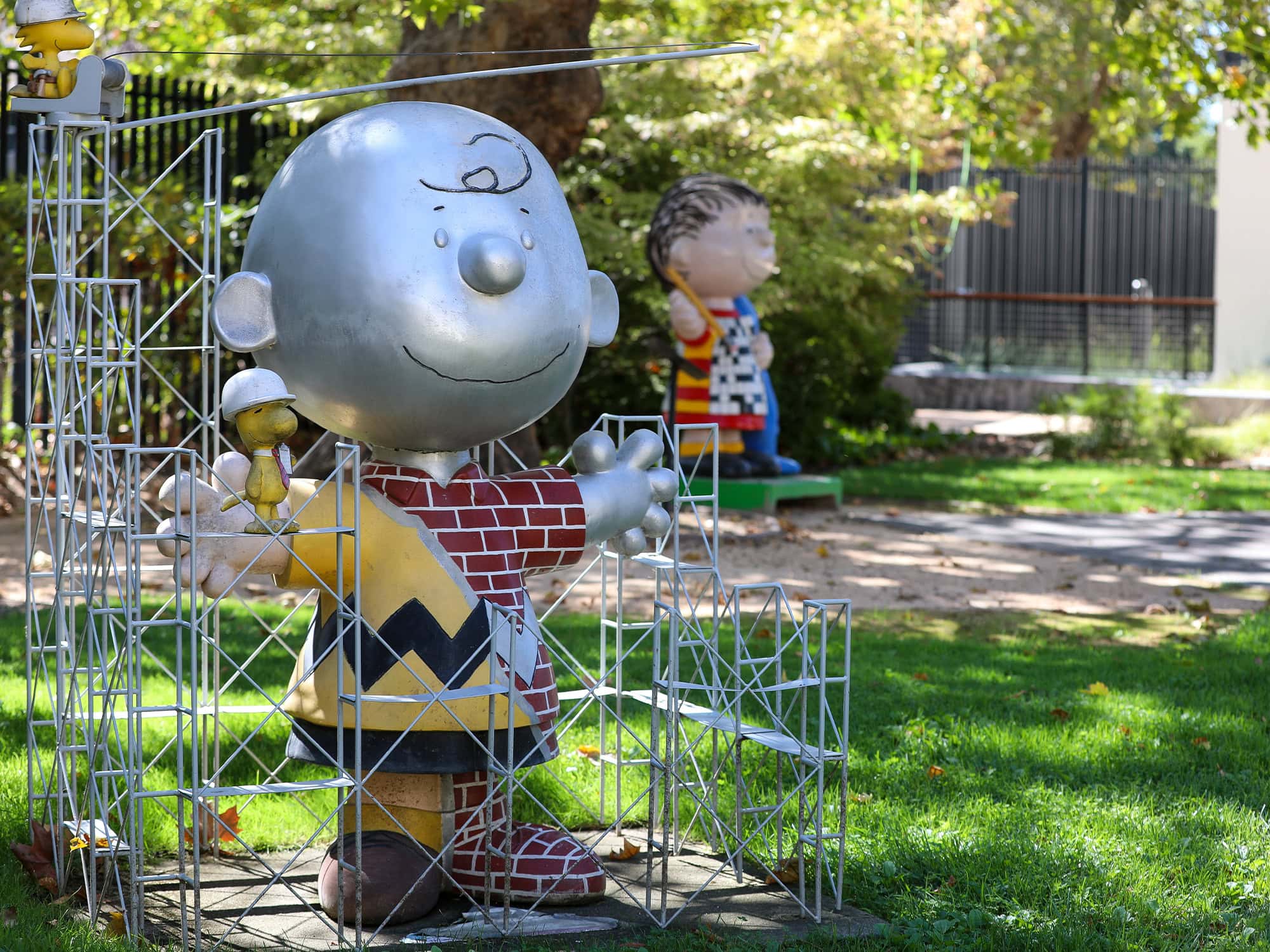 A sculpture of Charlie Brown in the courtyard outside at the museum