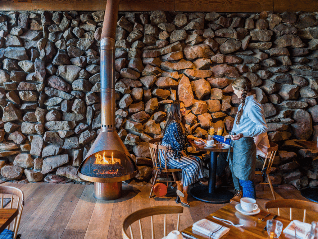 guests dining at coast kitchen restaurant located inside timber cove resort in sonoma county