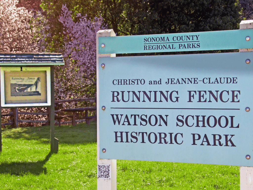 sign outside the the watson school historic park for the running fence art exhibit in valley ford