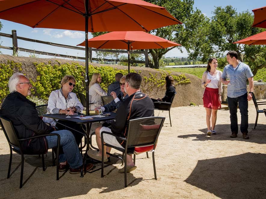 people gathering around patio