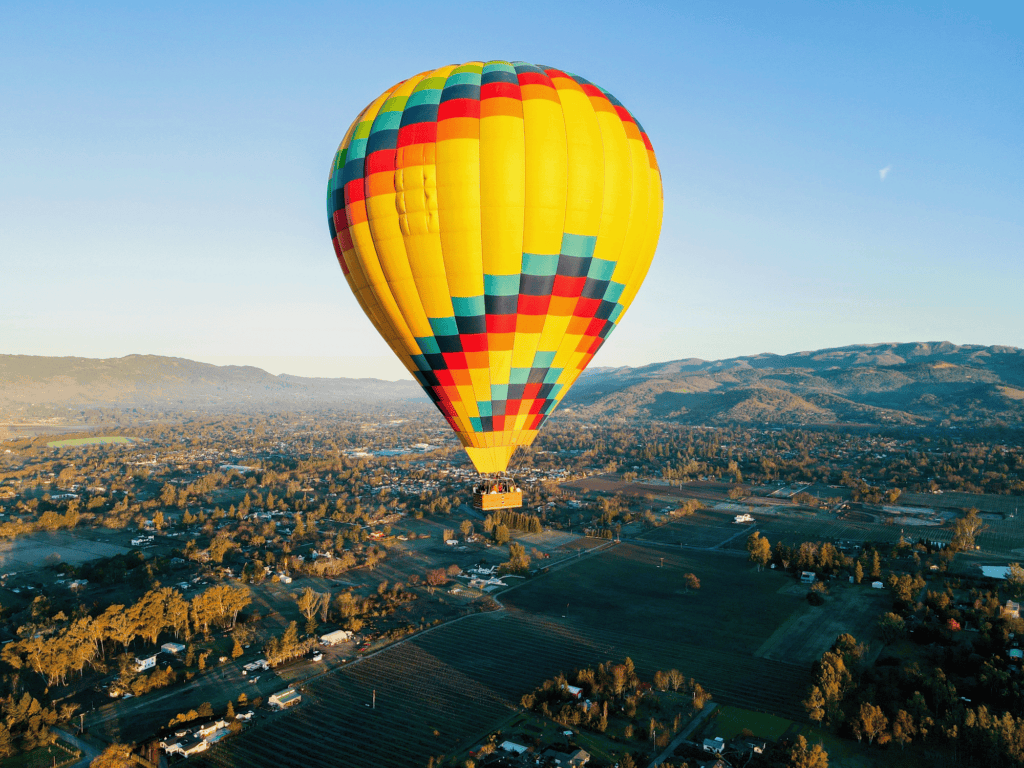 hot air balloon in the sky looking over sonoma county