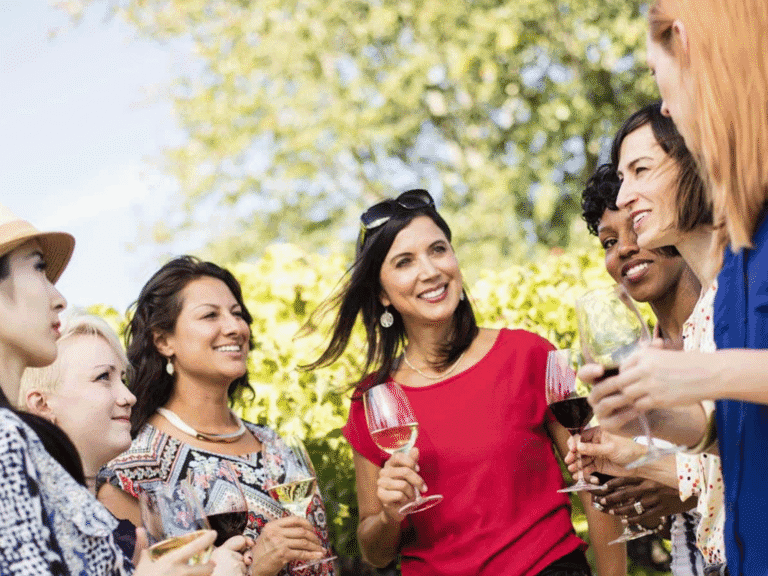 group of women on a girls trip drinking wine in sonoma county