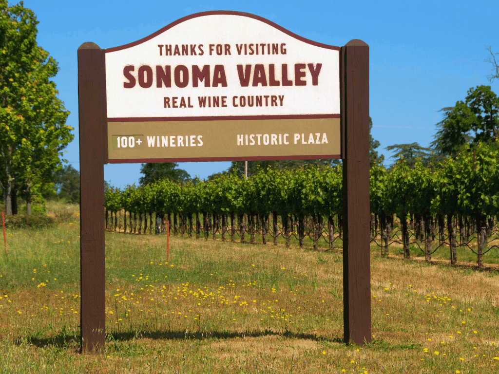a welcome sign in sonoma valley ava that says thanks for visiting sonoma valley real wine country