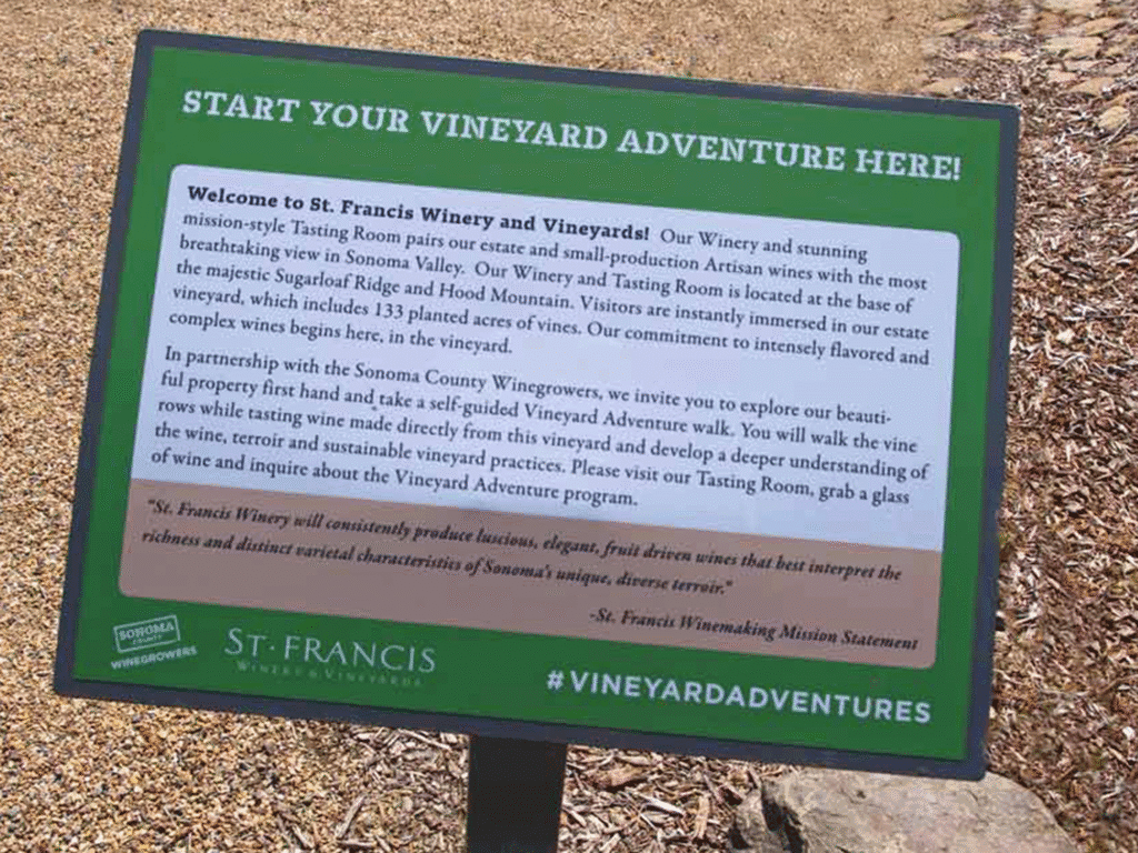 a sign at st francis winery for their self guideed vineyard walking through in sonoma county