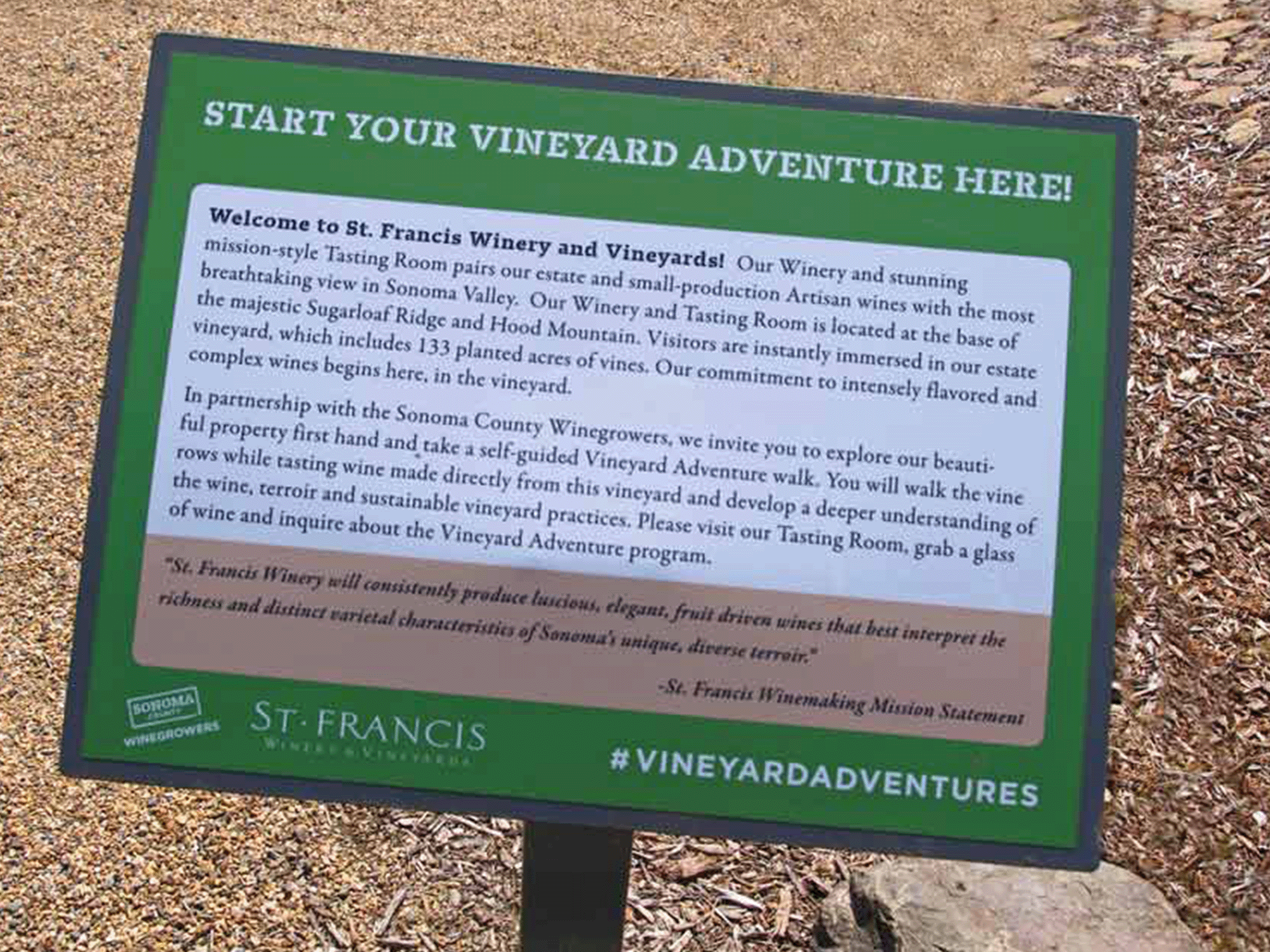 A sign explainign the free vineyard walking tours in Sonoma County