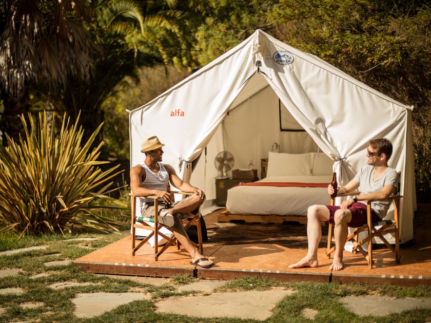 guests outside of a tent at glamping spot at Boon hotel and spa in Sonoma County