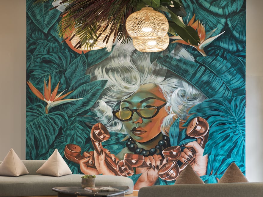 Hello, Checking In?, by San Francisco-based artist Serge Gay Jr covers a wall in the lobby of Flamingo Resort in Santa Rosa