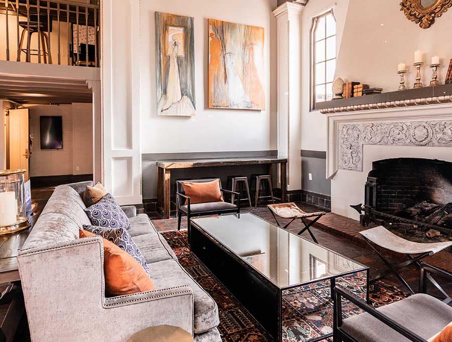 lounge area in hotel petaluma with fireplace and couches