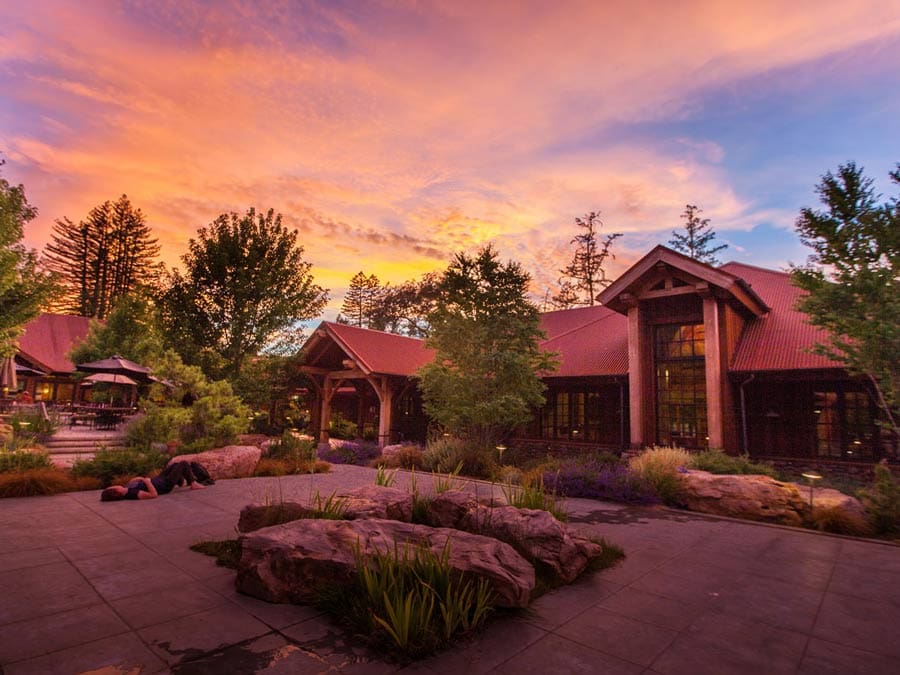 The wooden lodge at sunset