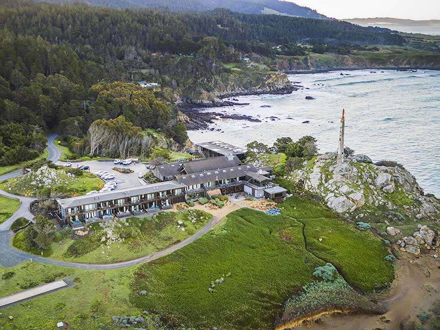 aerial view of timber cove resort on the coast