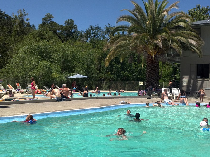 People swim in the spring-fed pool at Morton's Warm Springs Resort, Sonoma County