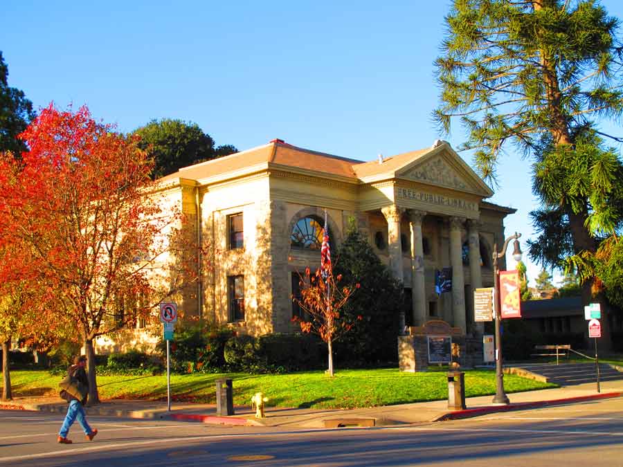 The outside of the museum is surrounded by trees in the fall