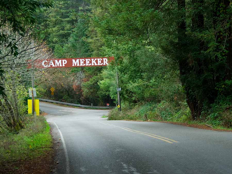 A sign across the Bohemian Highway reads Camp Meeker in Sonoma County