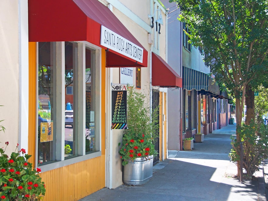 Bright awnings and colorful signs along the South A Street Arts District in Santa Rosa