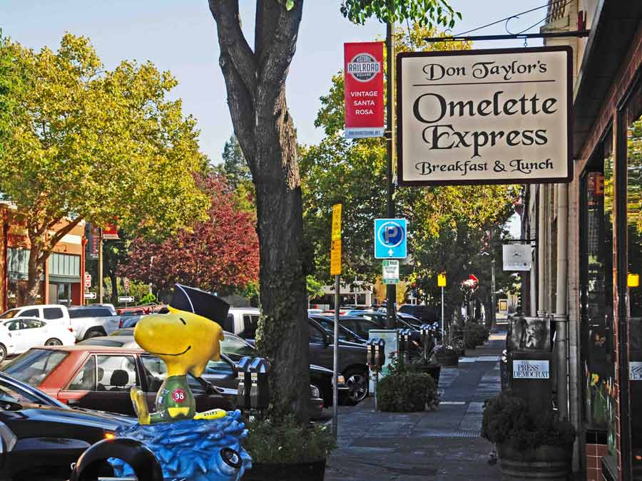 A statue of tweety bird sits outside along the sidewalk in Santa Rosa