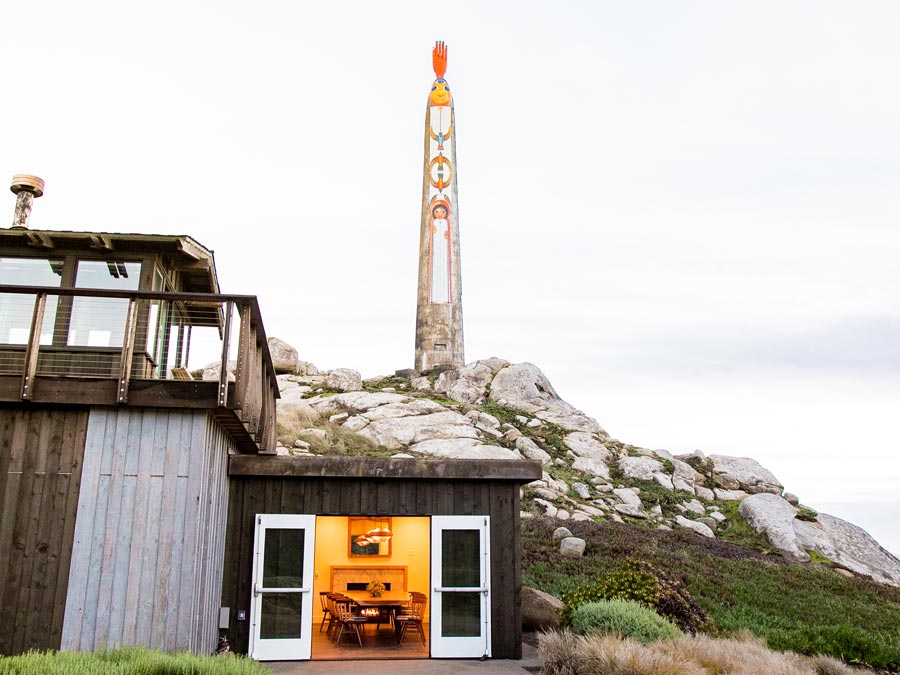 The tall statue is perched on top pf a cliff along the Sonoma coast