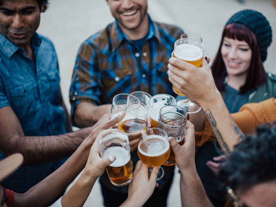 A group of friends raises a toast at Brewsters Beer Garden, Petaluma