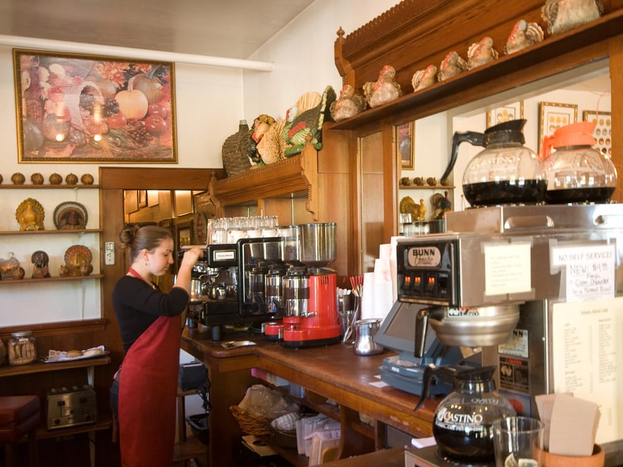 A barista makes coffee at Howard's Station Cafe in Sonoma County