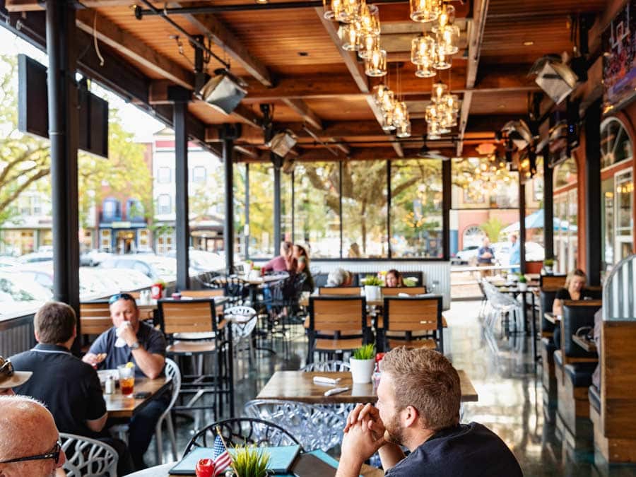 People dine on the covered patio