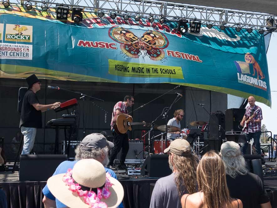 Fans dance to the music at the stage at the Petaluma Music Festival, Sonoma County