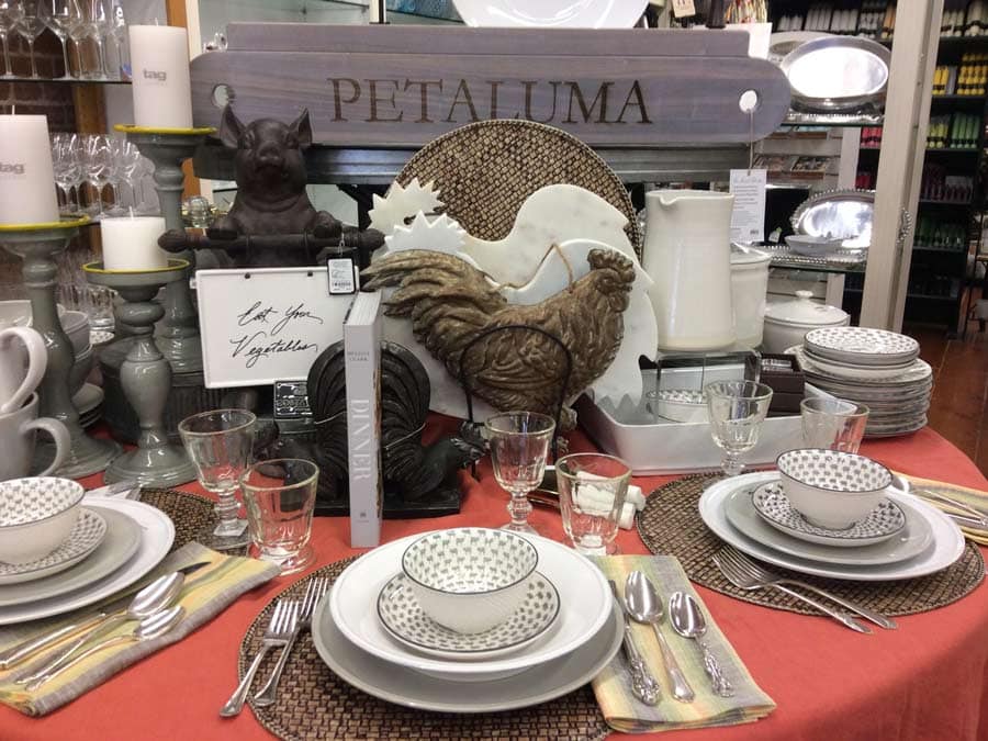 A table inside the store is covered with a place setting