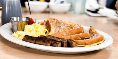 A plate of french toast, eggs, sausage and strawberries at Lita's Cafe in Santa Rosa.