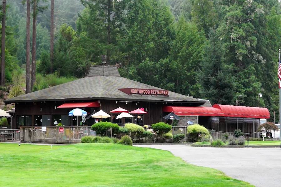 Exterior of the Northwood Restaurant, by a golf course and redwoods in Sonoma County's Monte Rio