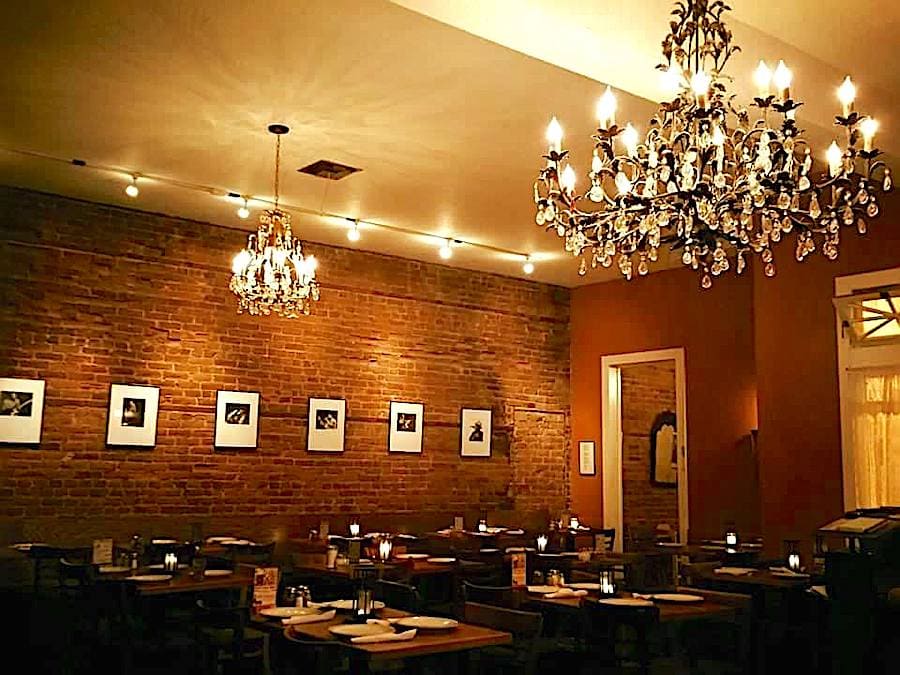 Cozy dining room with chandelier at Old Chicago Pizza in Petaluma