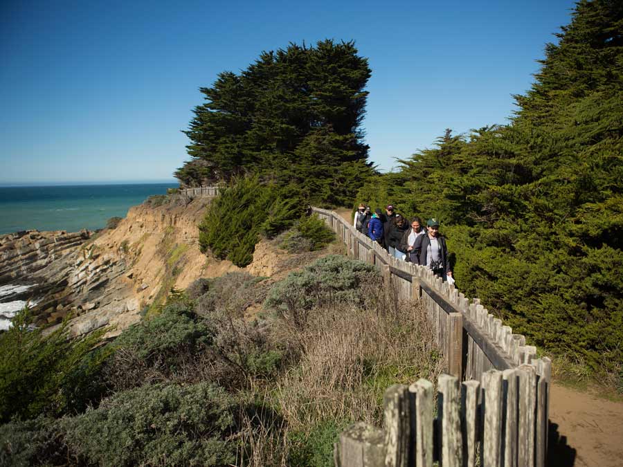 Hikers explore Gualala Point Regional Park, Gualala