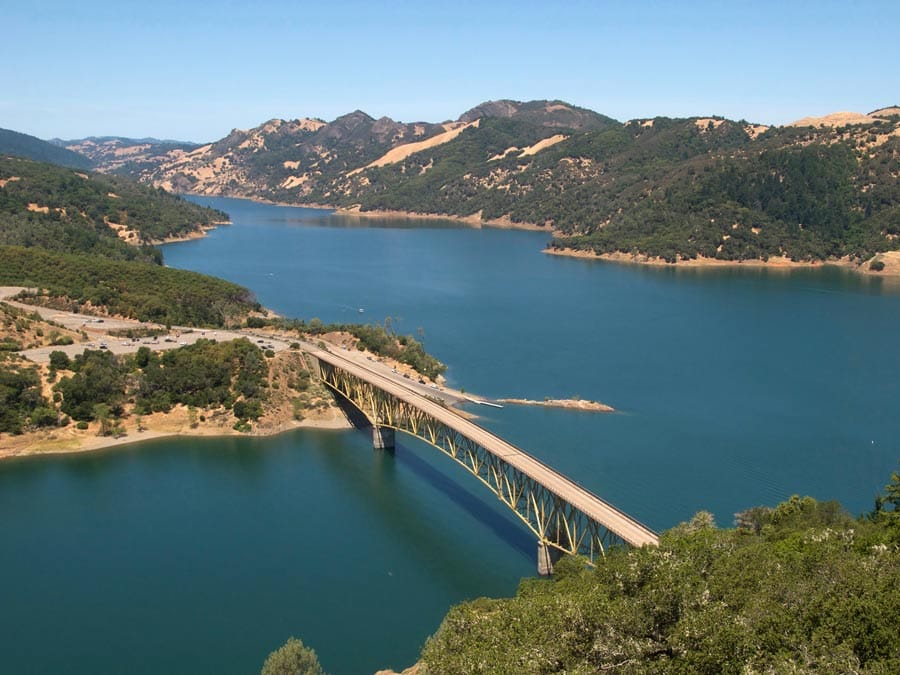 The bridhe crosses the lake and shines in the sun in Sonoma County