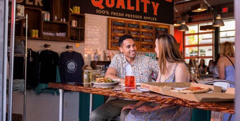 Couple at a table talking and dinning