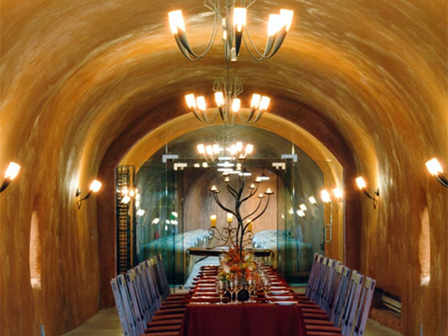 A table is set for a luxurious dinner in the cave at Benziger Family Winery, Glen Ellen