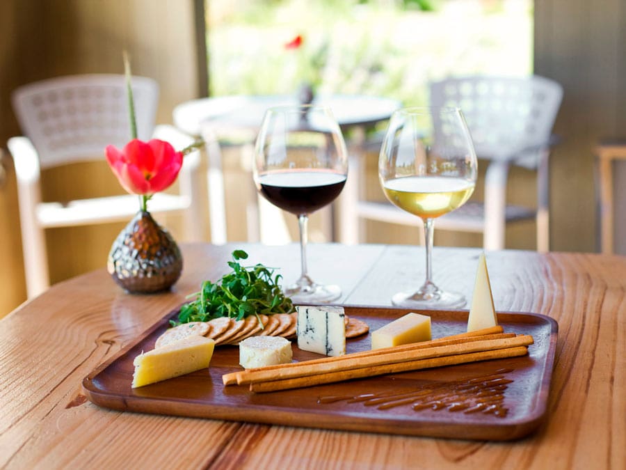 Cheese, bread, and wine ready to be enjoyed at Lynmar Estate, Sebastopol