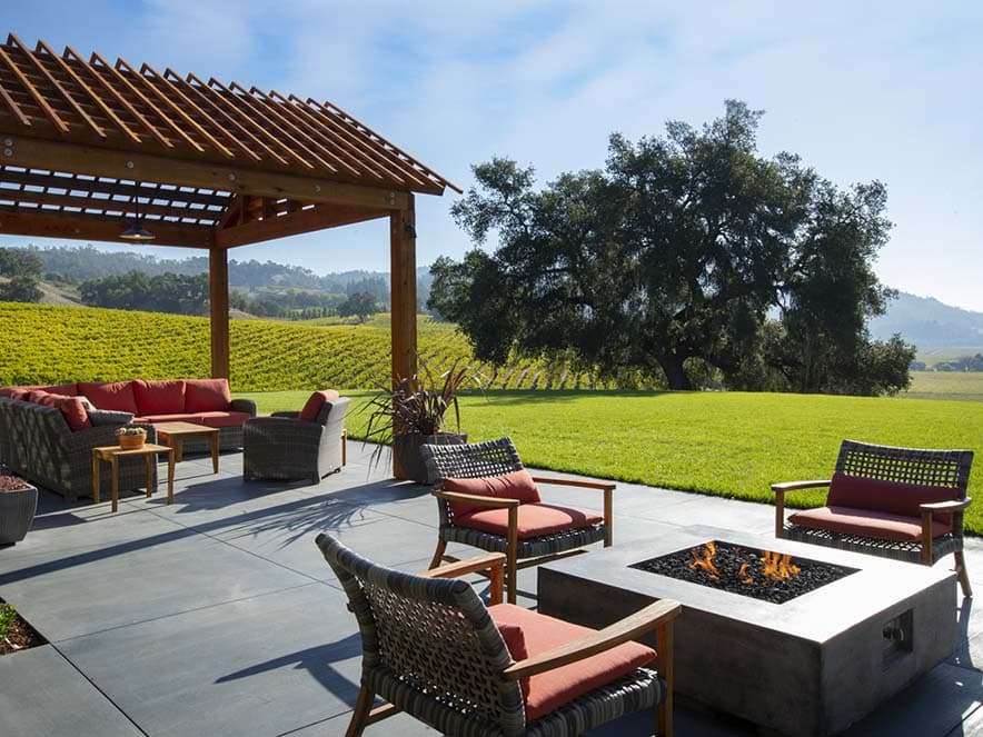 robert young estate outdoor patio with tables and chairs